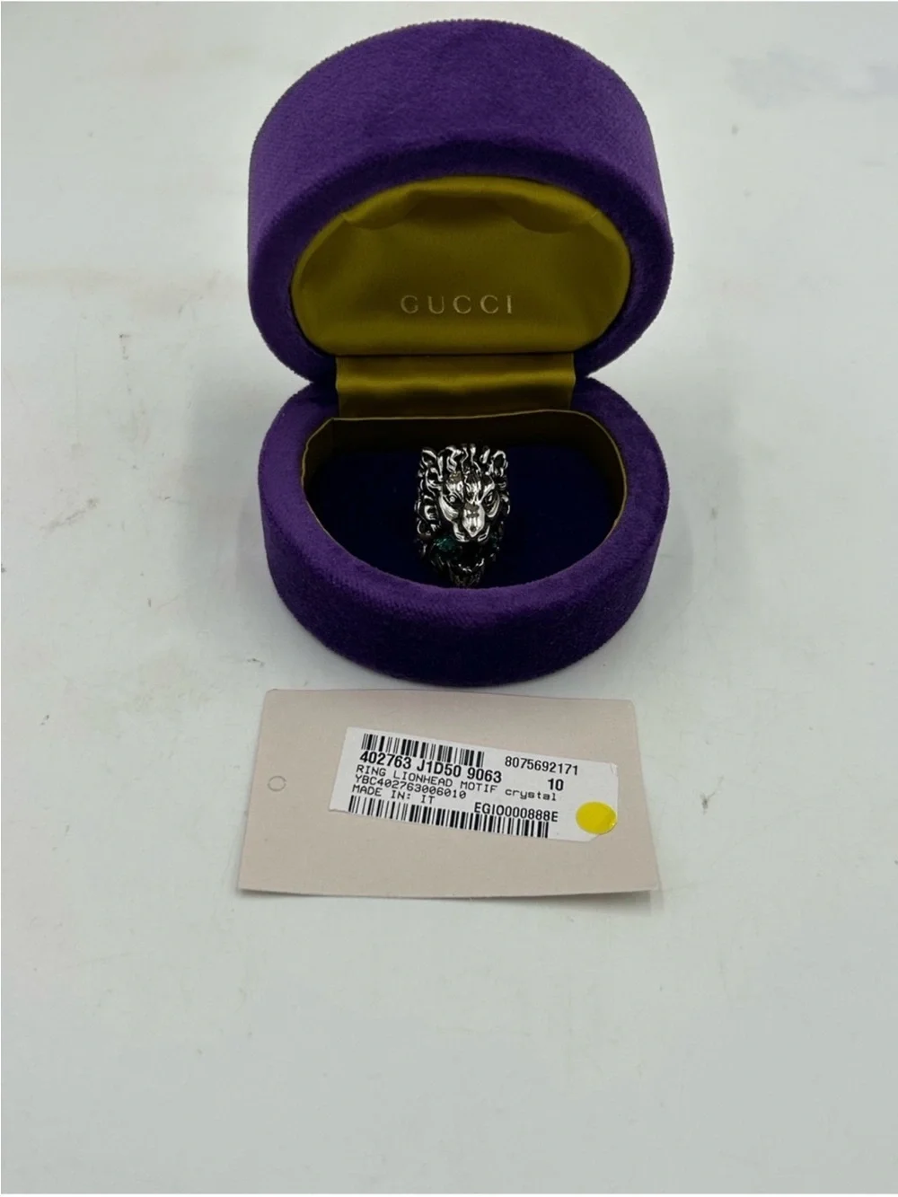 Unisex Gucci, silver Lionhead ring with green crystal in mouth size 4.5